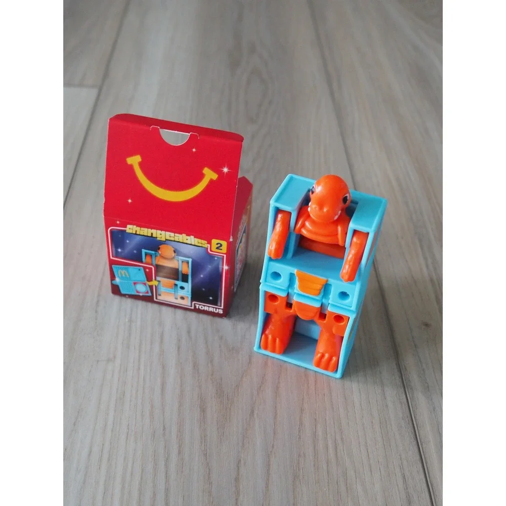 New McDonalds Changeables 2 Torrus Orange Blue Happy Meal Toy Robot Dinosaur